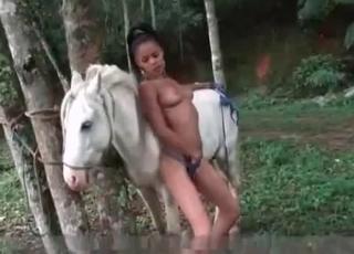 Slim slut enjoying this white pony