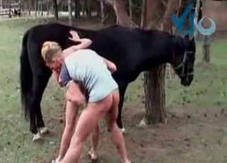 Bestiality banging with a sexy stallion